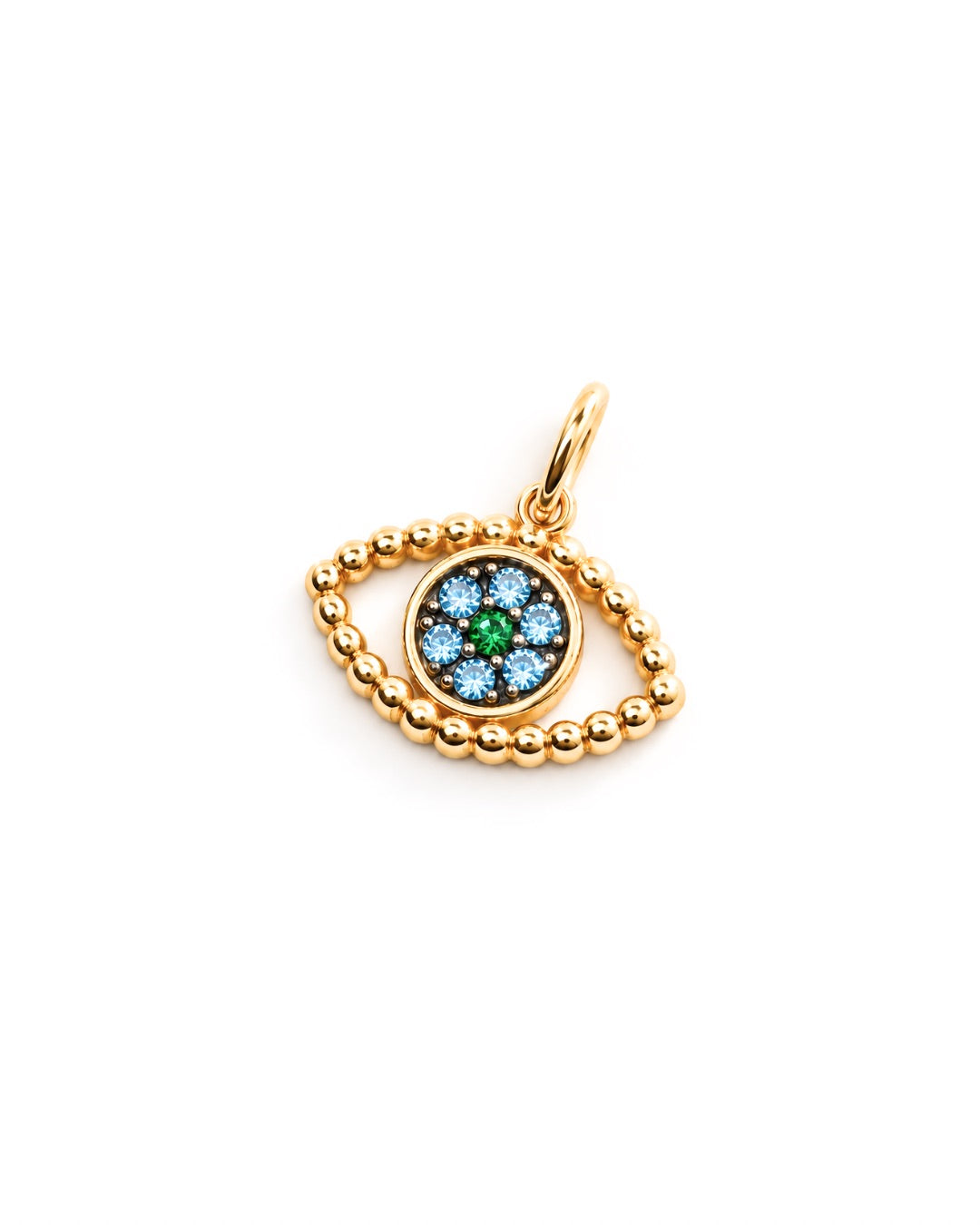 A gold evil eye pendant charm shaped like an eye, featuring a beaded outer border and a central circular cluster of blue and green stones, shown on a plain white background.