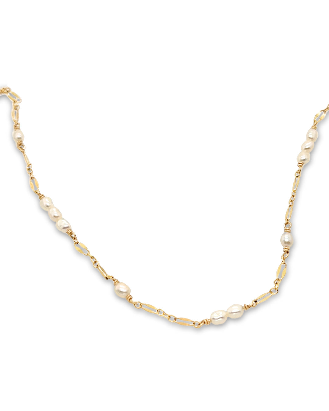 Australian-designed Stardust Pearl Choker with freshwater rice pearls intertwined with a sparkly gold fill chain for an elegant, shimmering look.