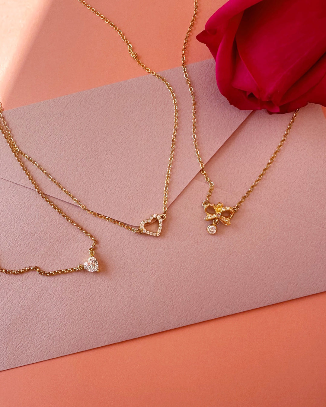 Gold vintage bow necklace with crystal-encrusted design and crystal drop, made in Australia; perfect Valentine's Day gift, birthday gift, or bridal jewelry. Coquette jewellery 