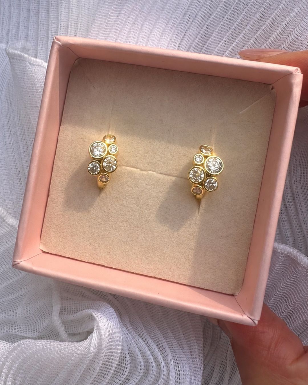 Romyli Bubble Cluster Huggies in 18k gold vermeil presented in a pink jewellery gift box