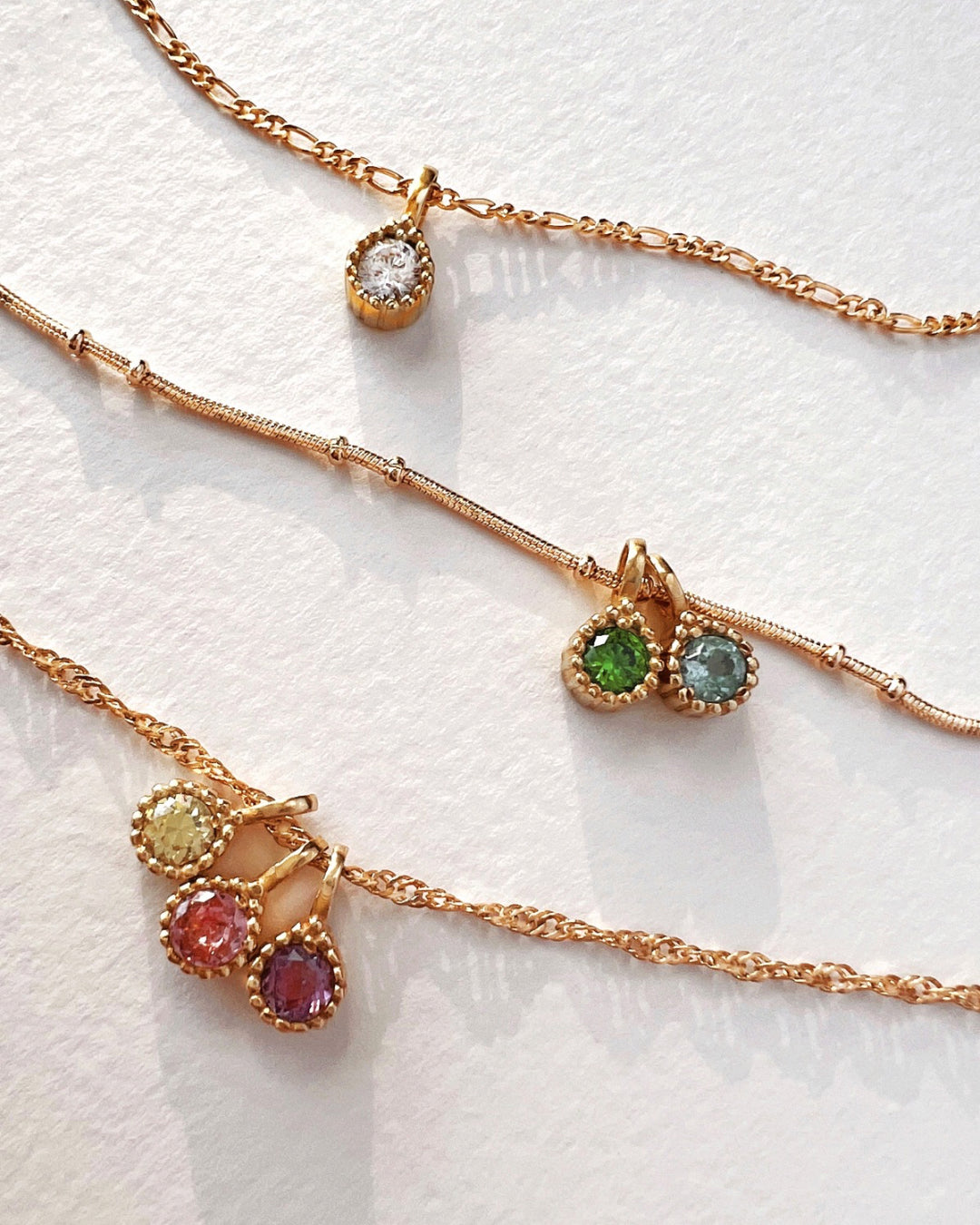 Gold Birthstone Necklace in Colours and Months, including January Garnet, February Amethyst, March Aquamarine, April Diamond, May Emerald, June Alexandrite, July Ruby, August Peridot, September Sapphire, October Tourmaline, November Citrine and December Topaz Cubic Zirconia Crystals