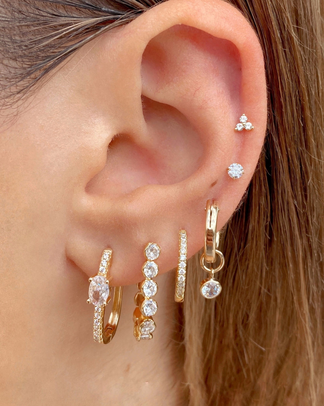 14k gold fill crystal diamond stud earring on a model