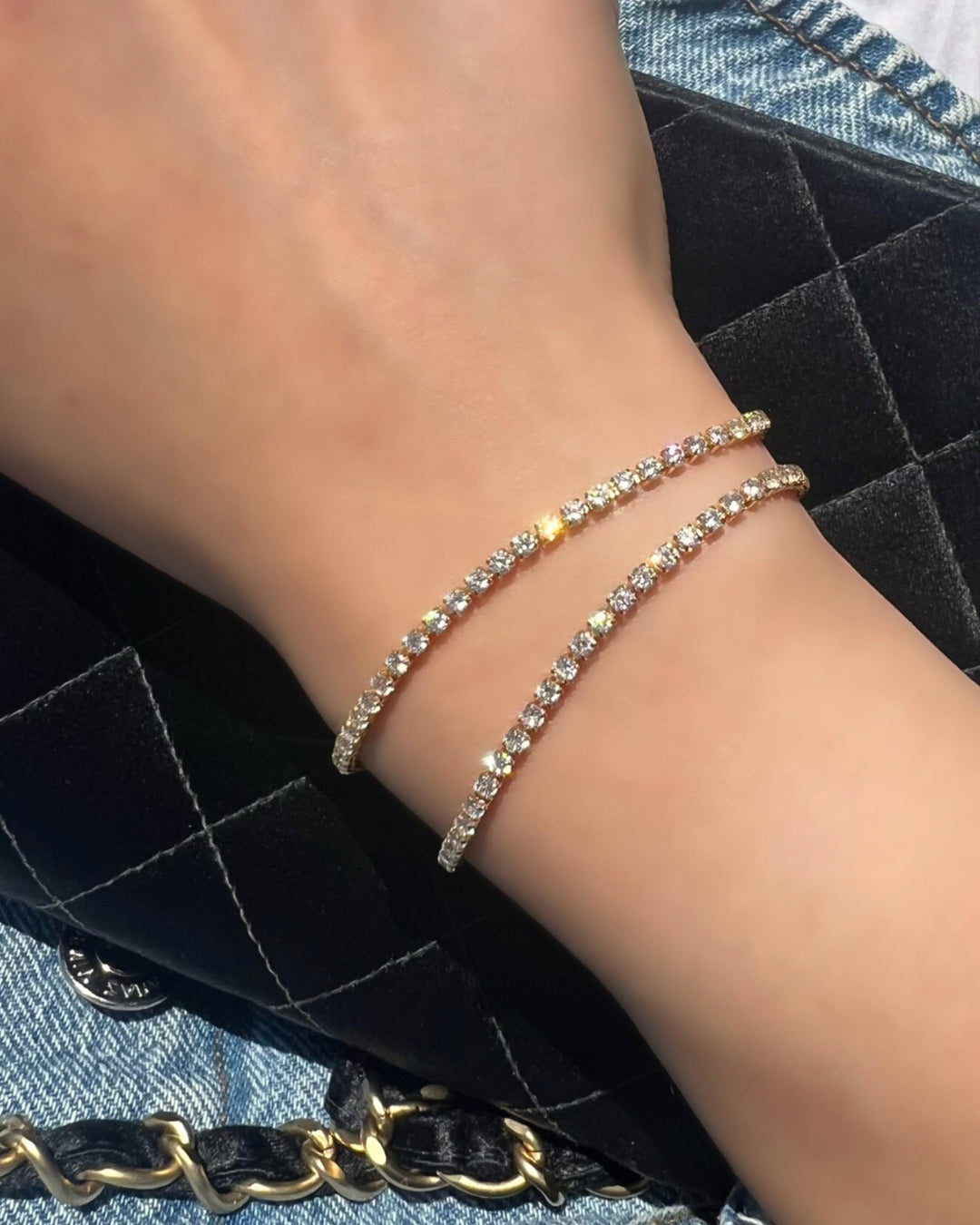 14k yellow gold fill petite tennis diamond bracelet on a model 