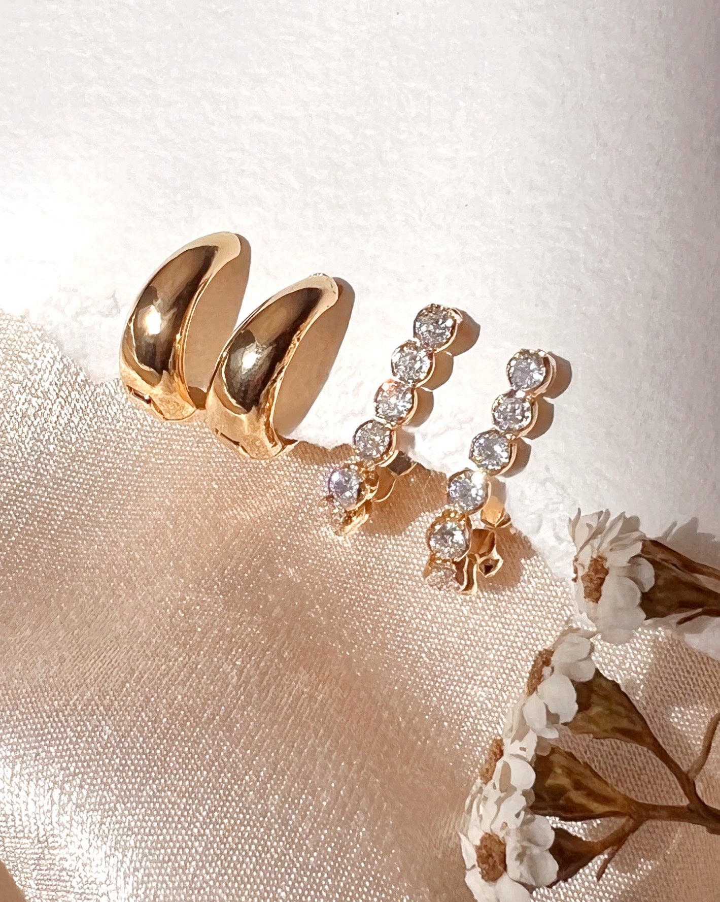 Gold cubic zirconia crystal tennis chain stud earrings and gold chunky dome Huggie hoops earrings 