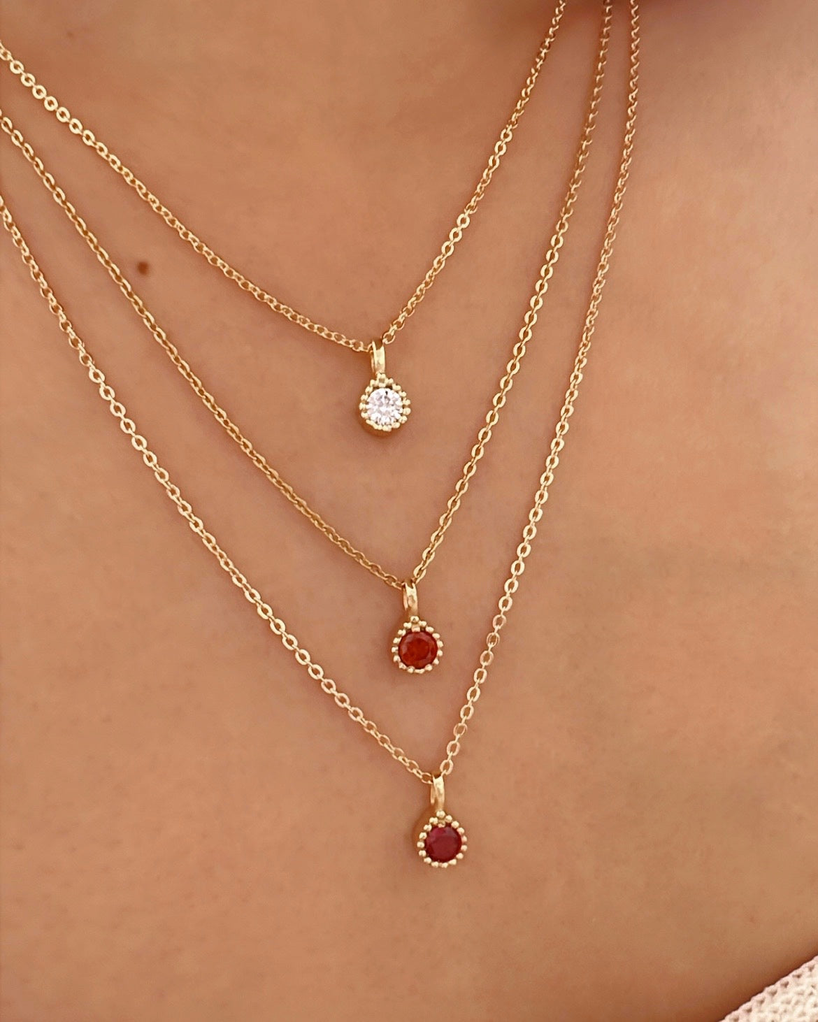 Gold Birthstone April Diamond Necklace Chain on a model. 