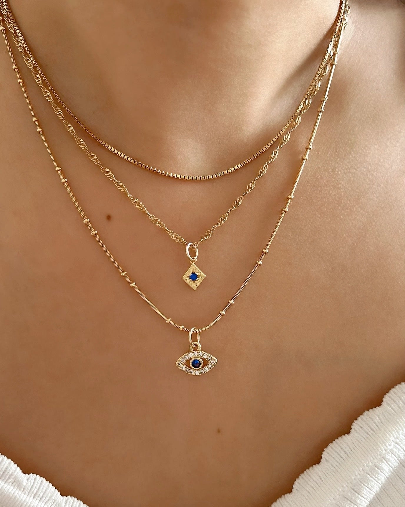 14k gold fill Asteria star mini pendant charm with blue sapphire cubic zirconia diamond crystal. Made in Australia. September Birthstone pendant.